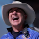 Amazon founder Jeff Bezos laughs as he speaks about his flight on Blue Origin’s New Shepard during a press conference on July 20, 2021 in Van Horn, Texas.